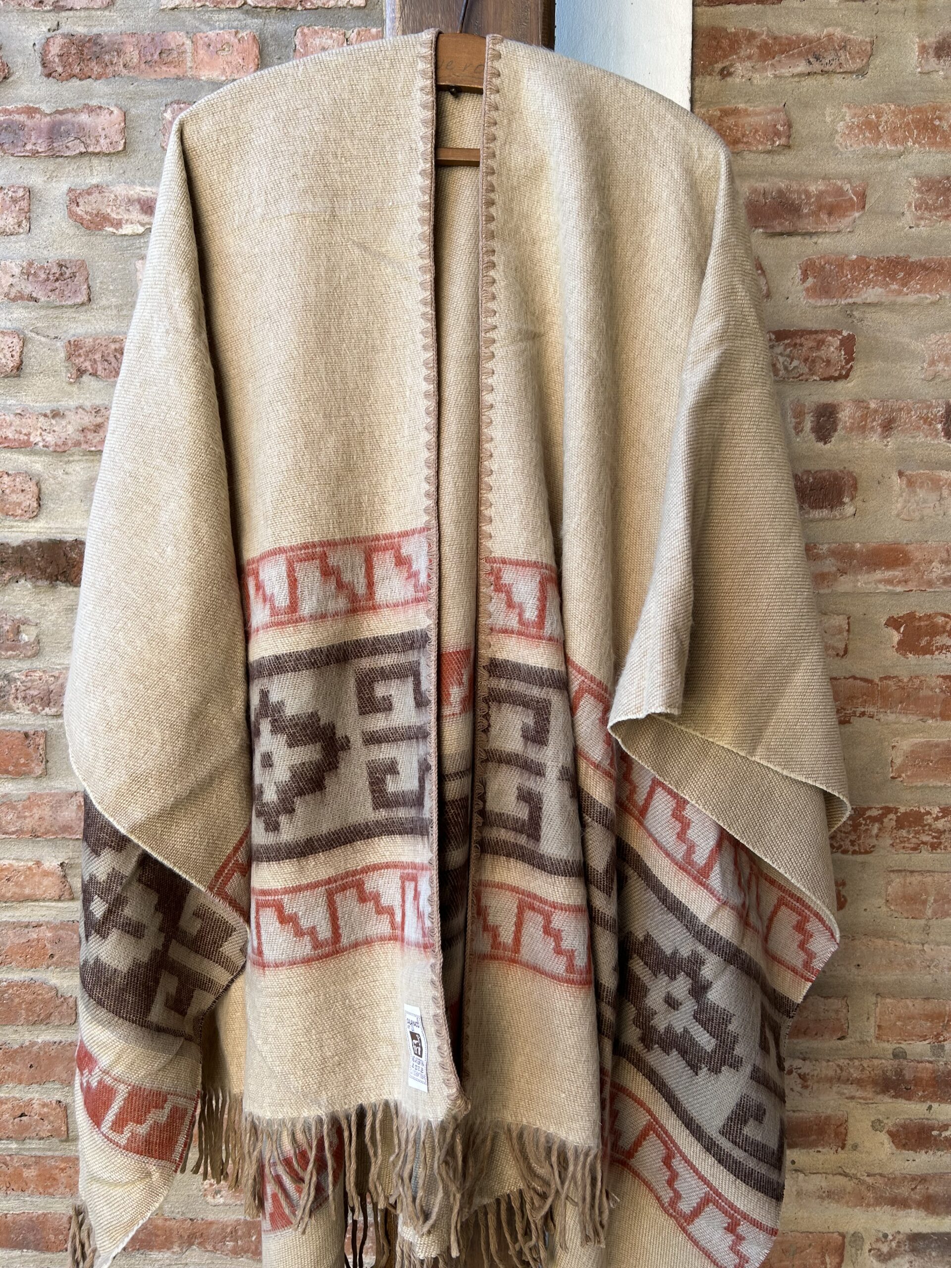 Ruana reversible con guarda art 310